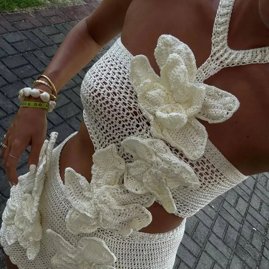 2026 Summer Collection Features a Casual Dress with a Floral Hollow-Out Design Perfect for Beach Outings